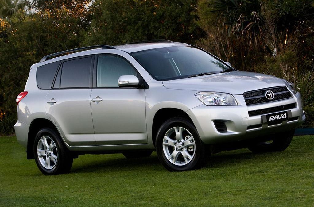 Toyota RAV4 compact 4x4 SUV parked outside, highlighting the vehicle option available through a Toyota Rav4 rental Rwanda package.