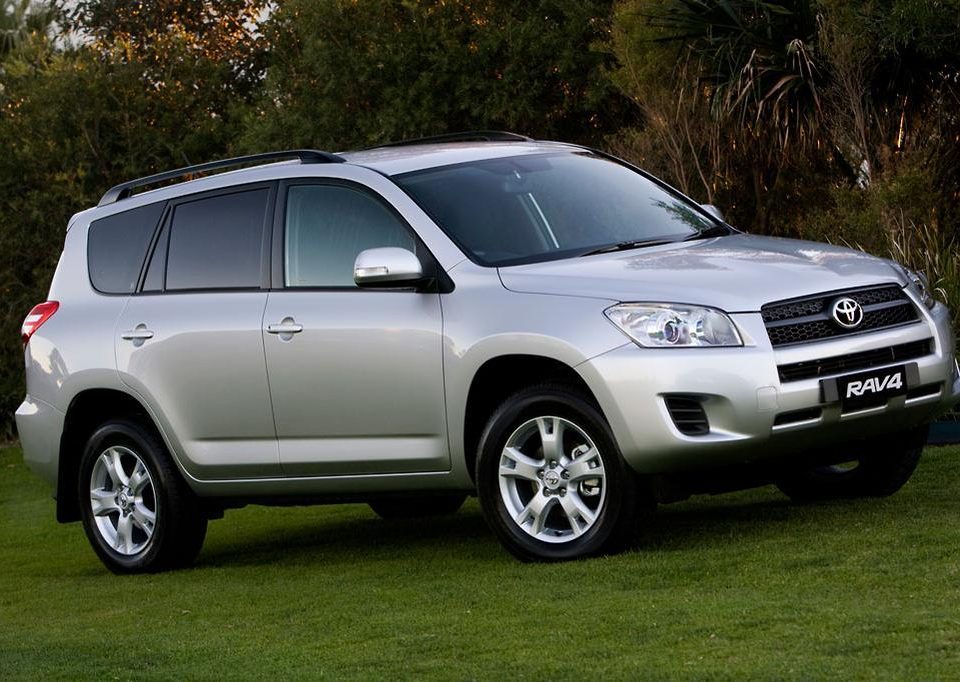 Toyota RAV4 compact 4x4 SUV parked outside, highlighting the vehicle option available through a Toyota Rav4 rental Rwanda package.
