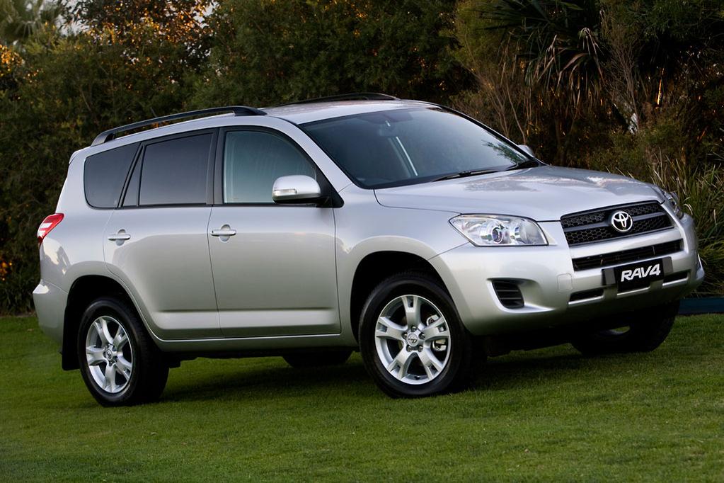 Toyota RAV4 compact 4x4 SUV parked outside, highlighting the vehicle option available through a Toyota Rav4 rental Rwanda package.