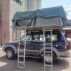4x4 Toyota Land Cruiser safari vehicle equipped for Rooftop Tent Car Hire Rwanda driving on a dirt road in Akagera National Park.