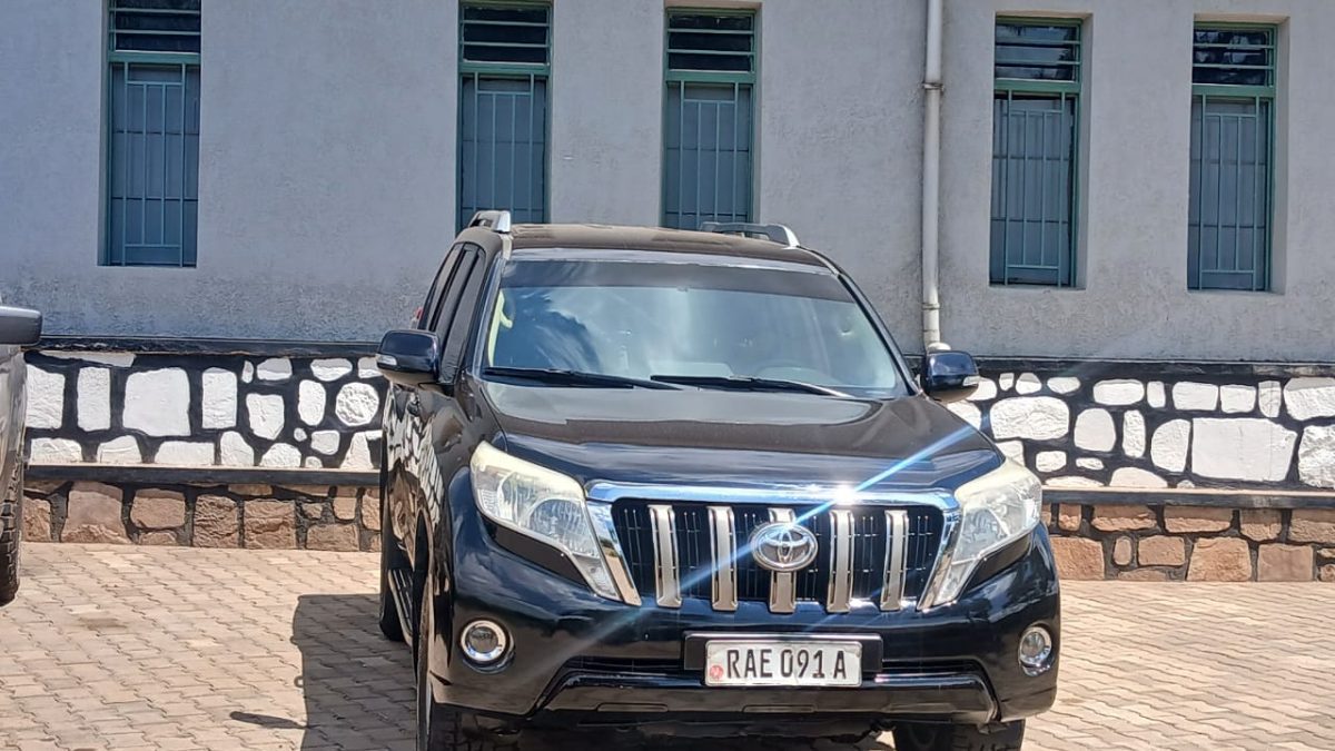 Rental SUV travelling along the scenic Lake Kivu road in Rwanda