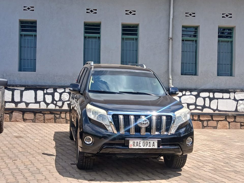 Rental SUV travelling along the scenic Lake Kivu road in Rwanda